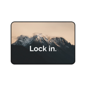 mousepad with mountain background and white text lock in